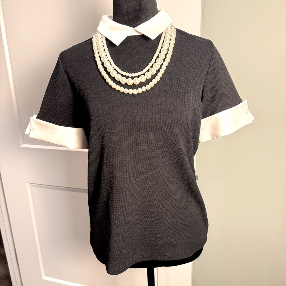 Classic Black Short-Sleeve Top with White Collar and Cuffs